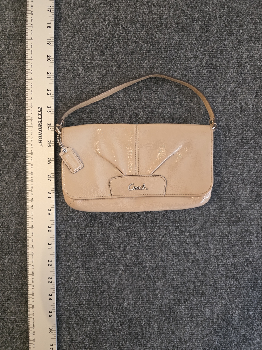 Coach Patent Leather Wristlet Clutch in Beige